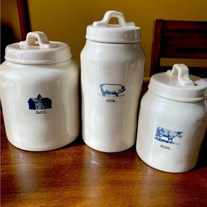 Discontinued Rae Dunn farm canister set. The cluck canister is not original.